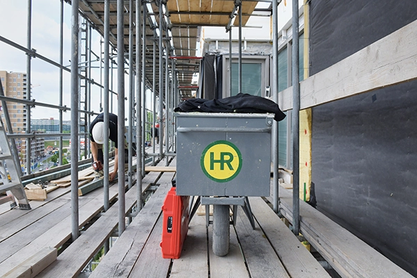Hillen en Roosen kruiwagen op bouwplaats